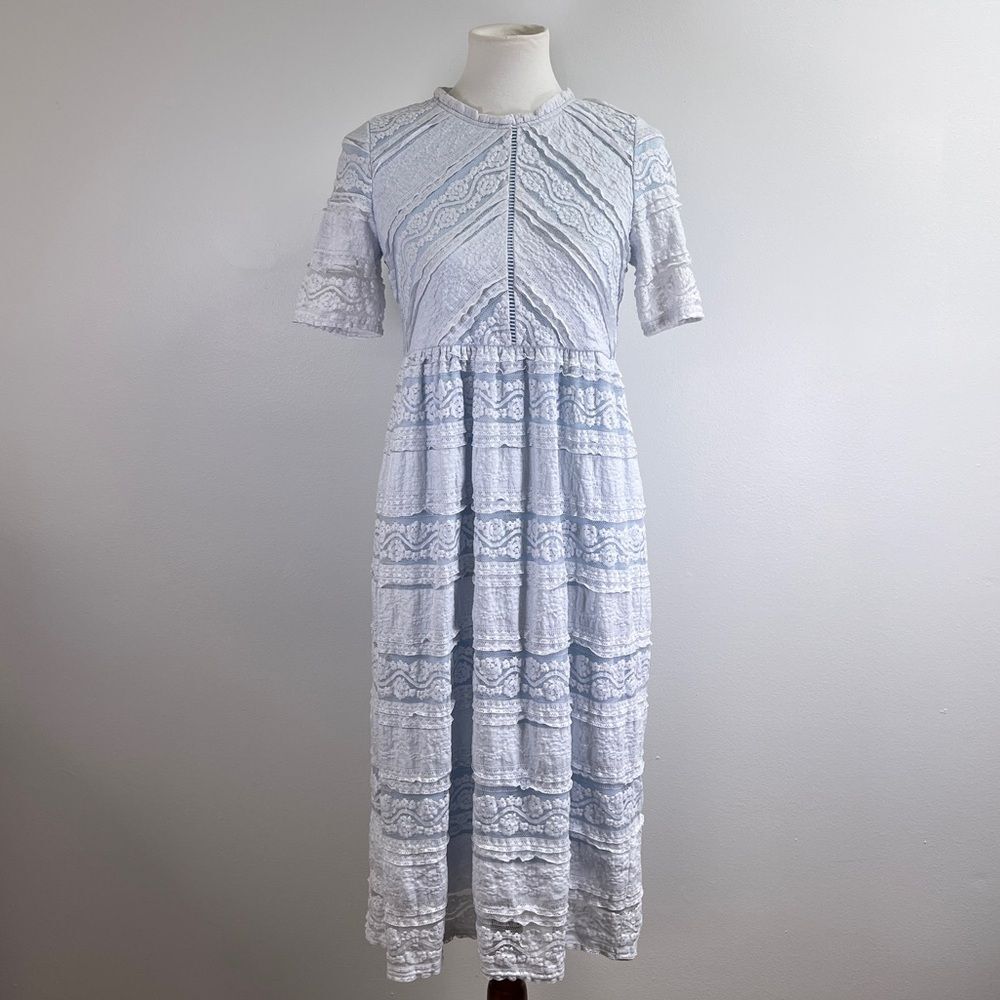 Saving Paige Floral lace short sleeved dress, sz small. Light blue white tiered
